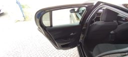 Peugeot e-208 completo