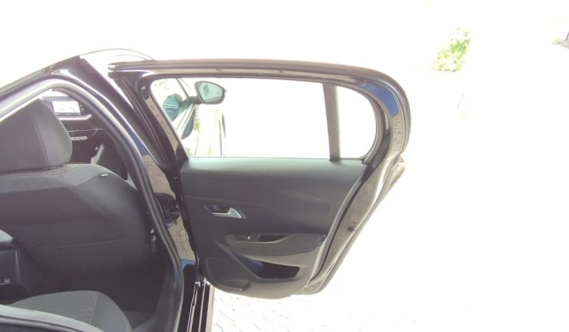 Peugeot e-208 completo