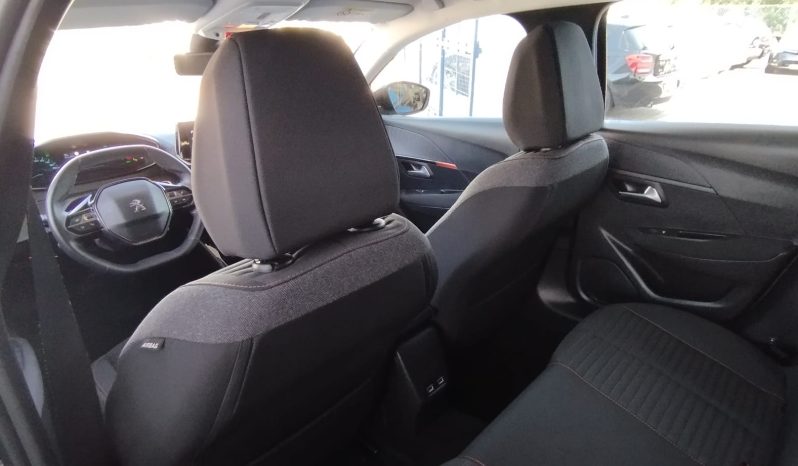 Peugeot e-208 completo