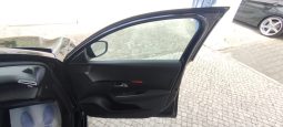 Peugeot e-208 completo