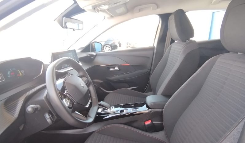 Peugeot e-208 completo