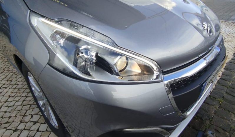 Peugeot 208 completo