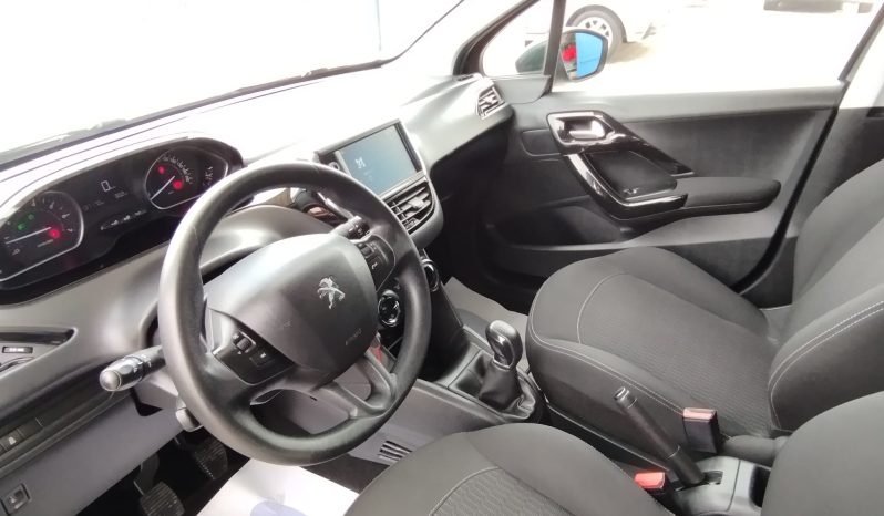 Peugeot 208 completo