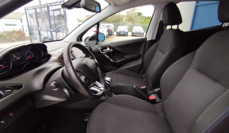 Peugeot 208 completo