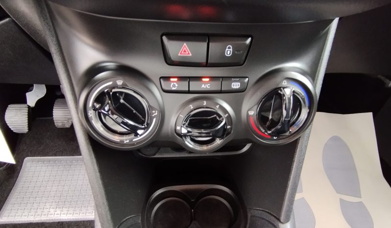 Peugeot 208 completo