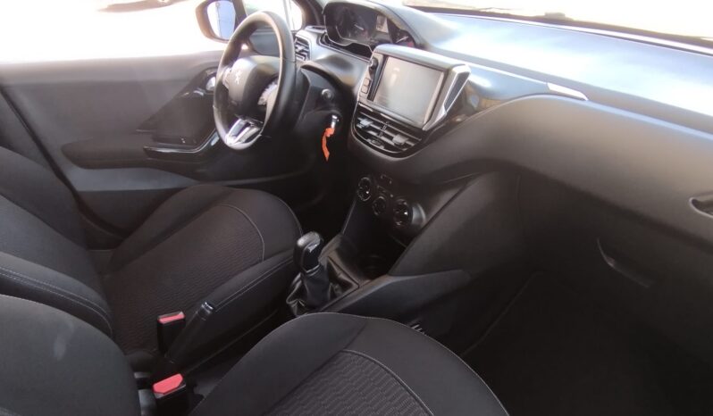 Peugeot 208 completo