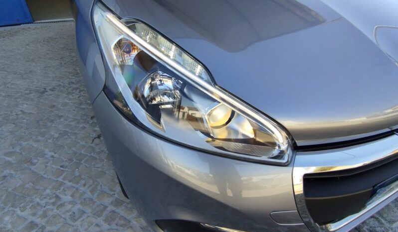 Peugeot 208 completo