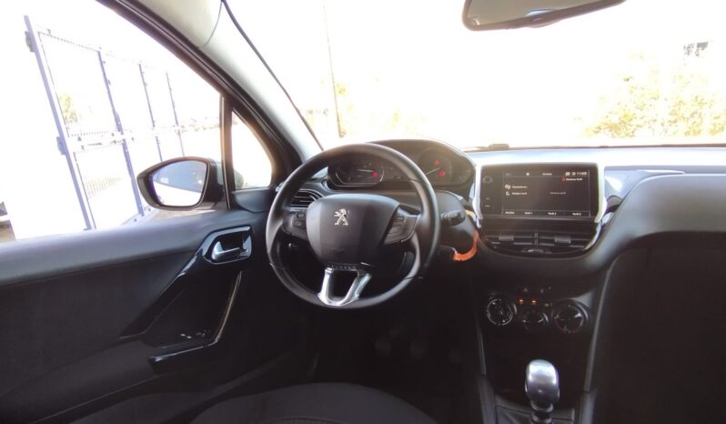 Peugeot 208 completo